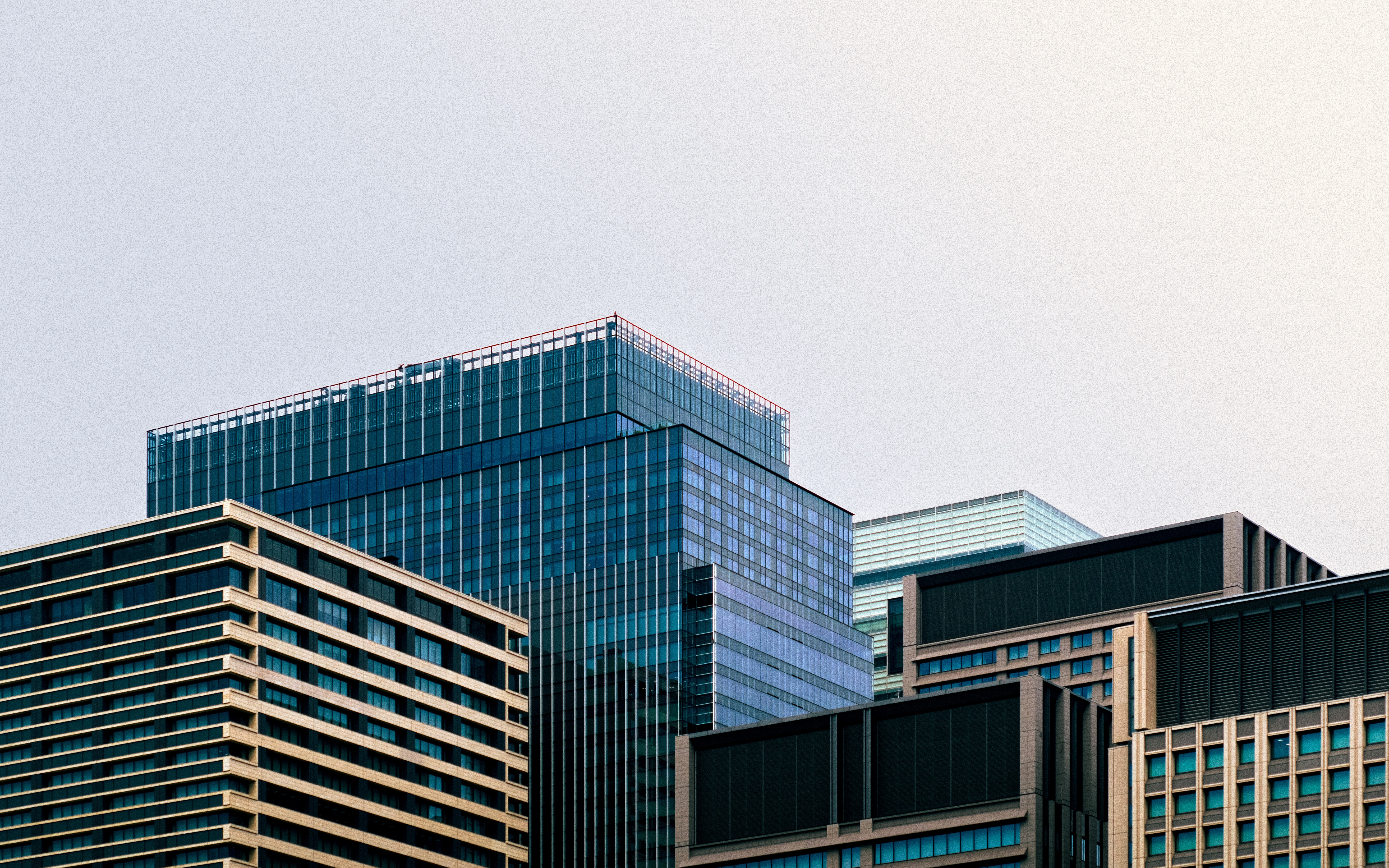 Modern city skyline — the businesses Noble IT keeps running